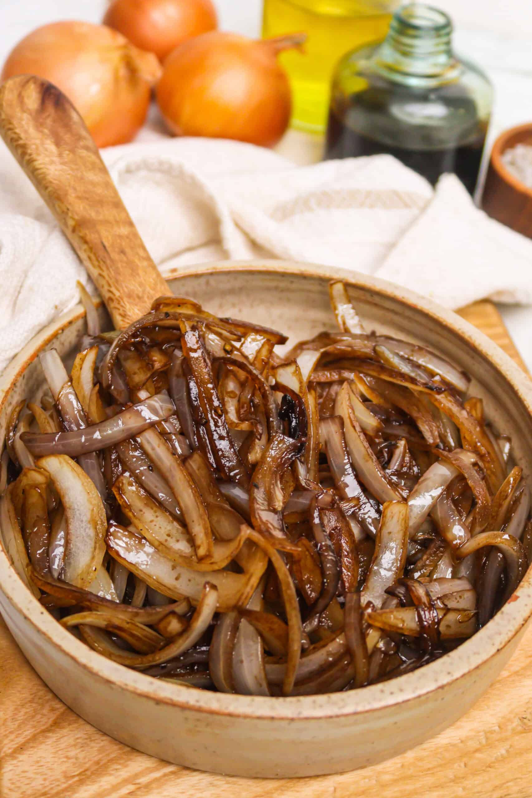 A chef sautéing onions